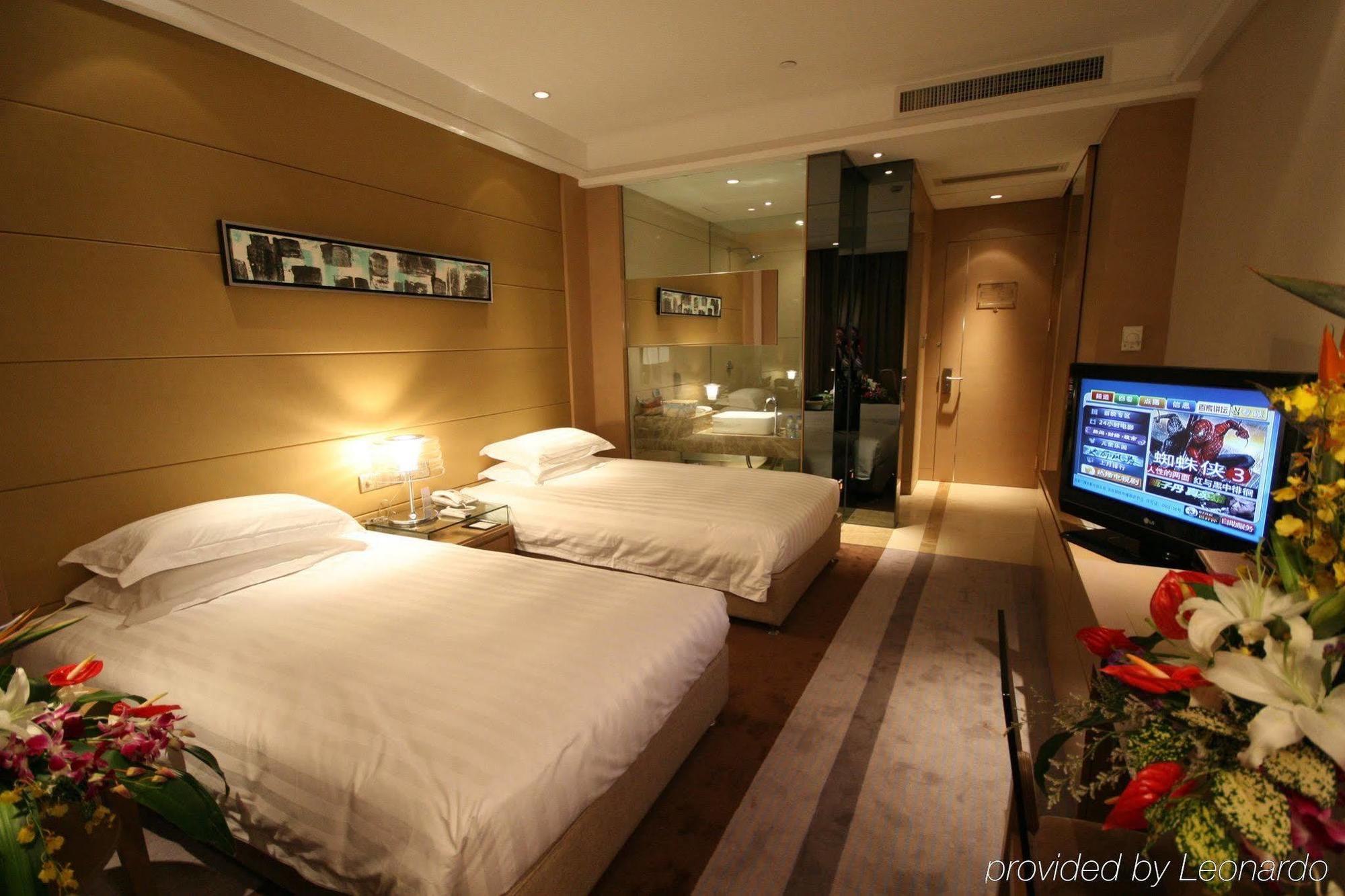 Four Seasons Rayli Hotel Ningbo Quarto foto